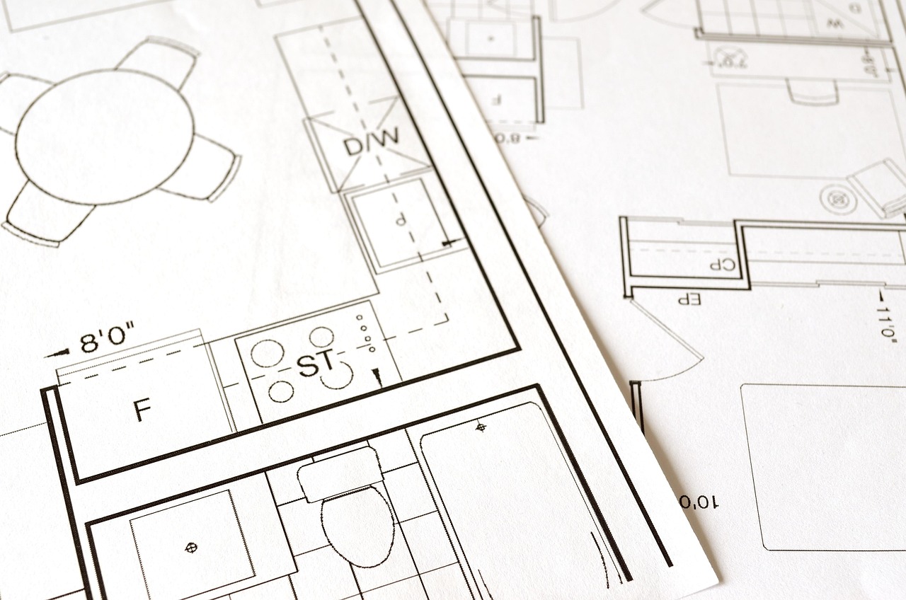 interior designer reviewing residential renovation plans